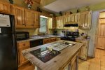 Counter space and island to prepare meals for the family